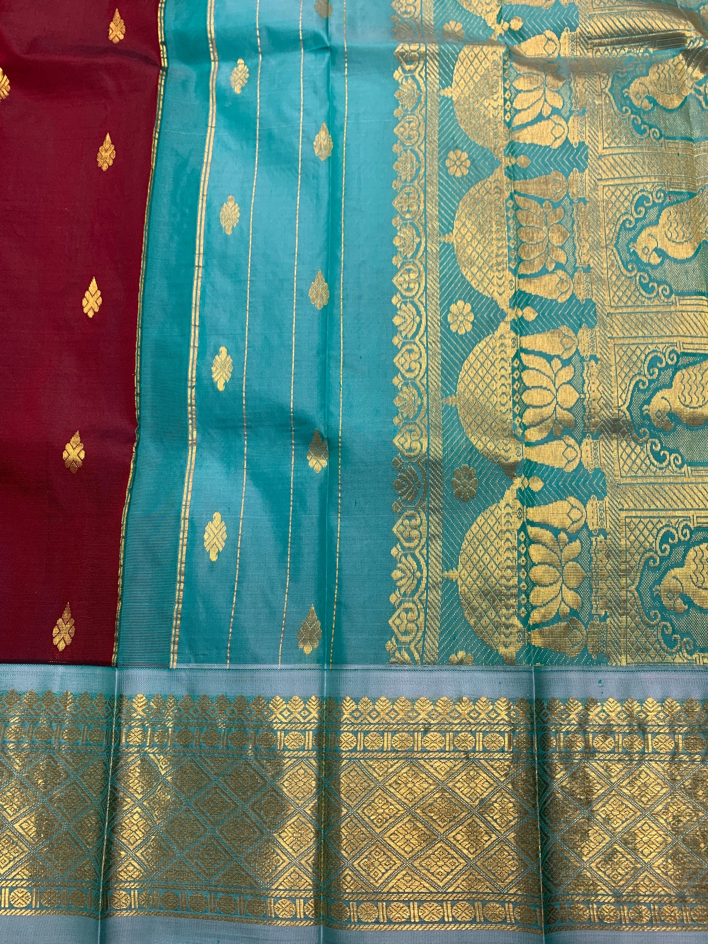 Pure Kanchipuram Silk Saree Maroon Colour with Sky Blue and Gold Zari Border