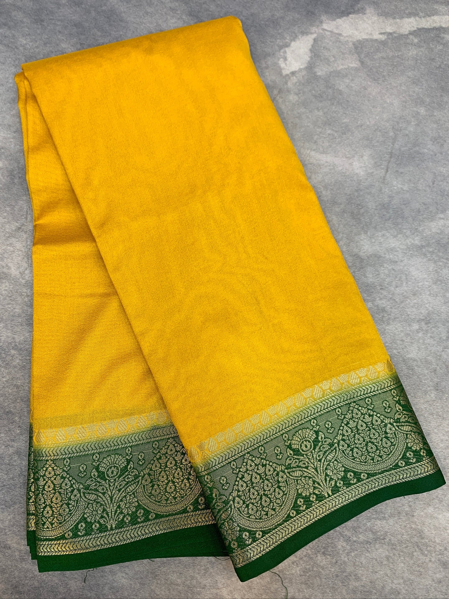 Crepe Saree Yellow Colour with Green Border