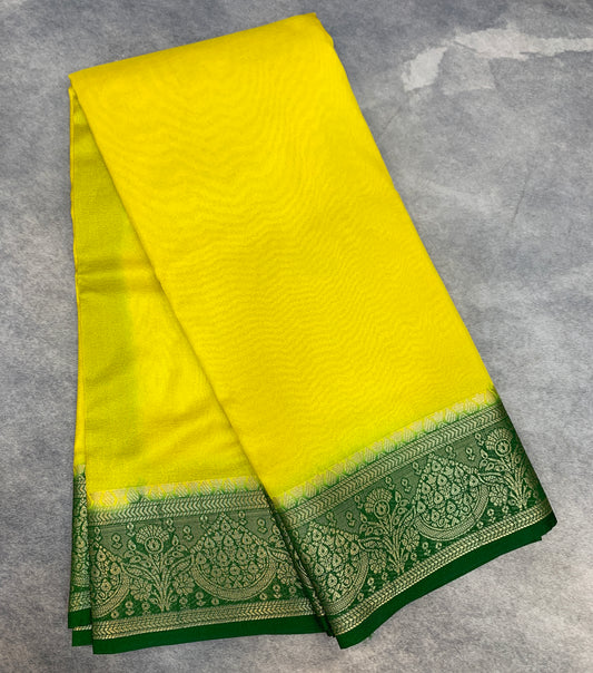 Crepe Saree Lemon Yellow Colour with Green Border
