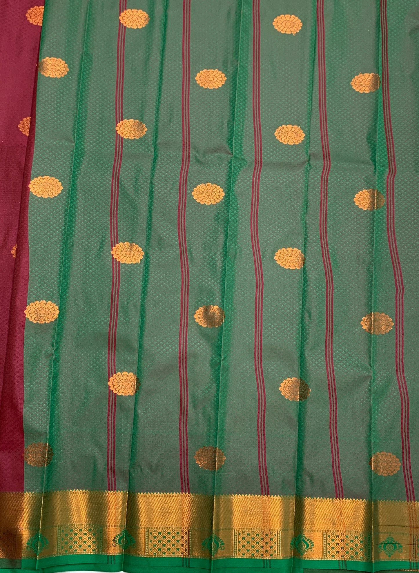 Maroon Shade Silk Cotton Saree with Copper Zari Border and Floral Design