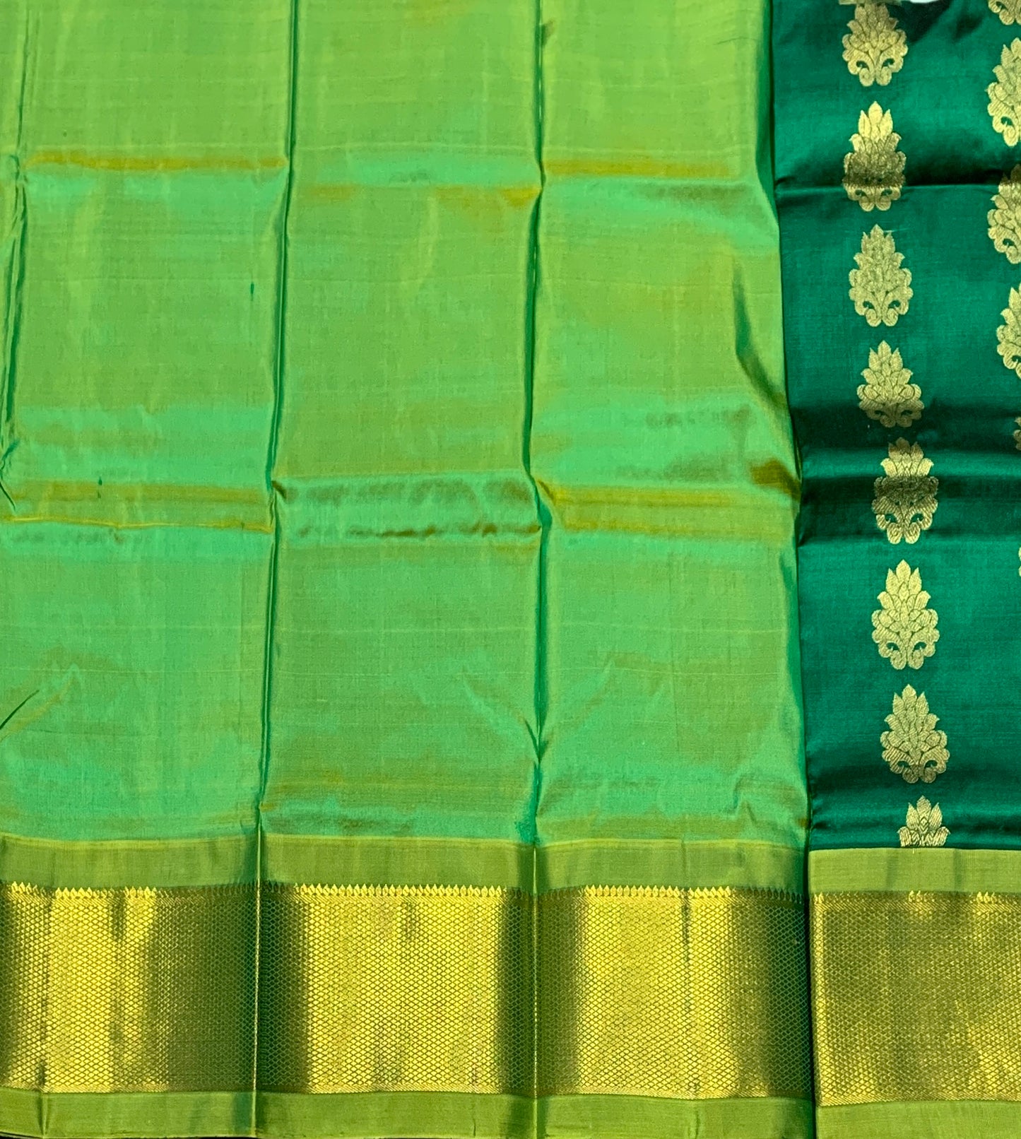 Green Shade Pure Kanchipuram Kids Pattu Pavadai with Contrast Border for Newborn to 2 Years