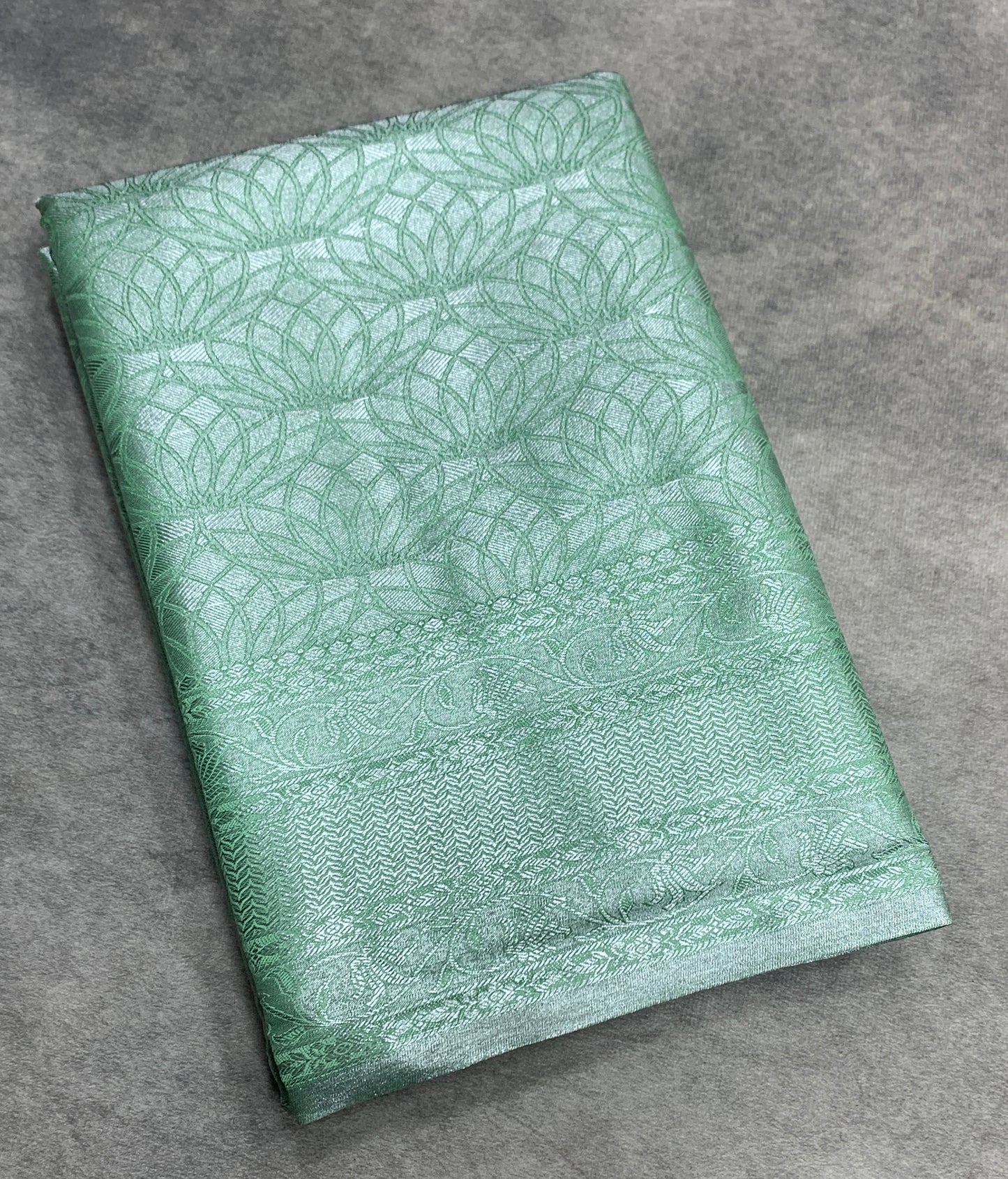 Fancy Tissue Saree Pista Green Colour with Self Design Border