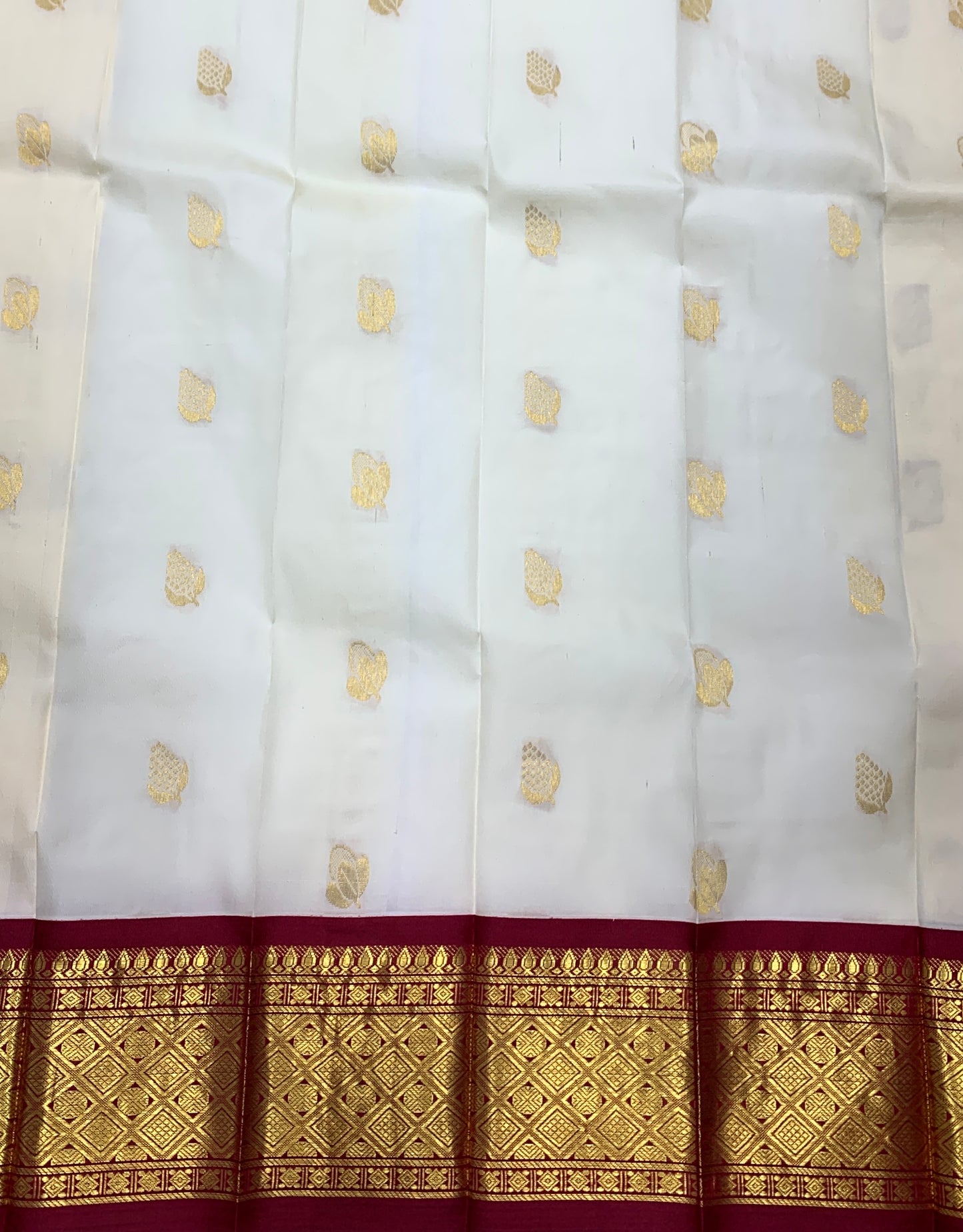 Pure Kanchipuram Silk Saree Ivory Colour with Maroon and Gold Zari Border