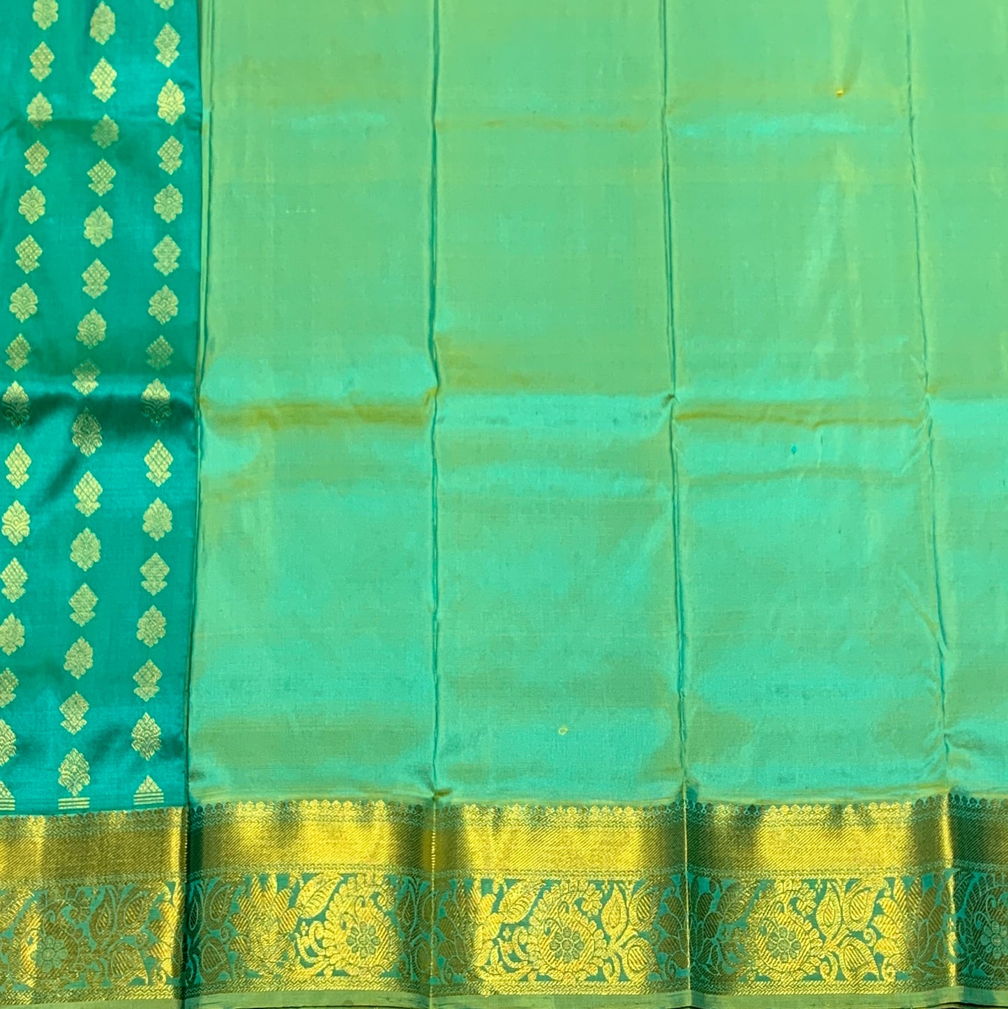 Rama Green Shade Pure Kanchipuram Kids Pattu Pavadai with Contrast Border for Newborn to 2 Years
