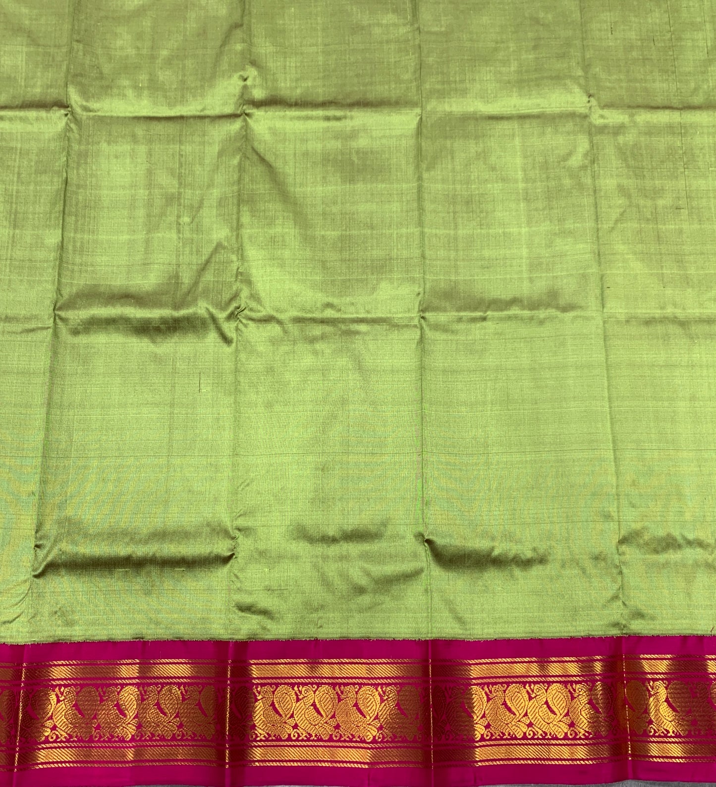 Olive Green Shade Pure Kanchipuram Kids Pattu Pavadai with Contrast Border for Newborn to 2 Years