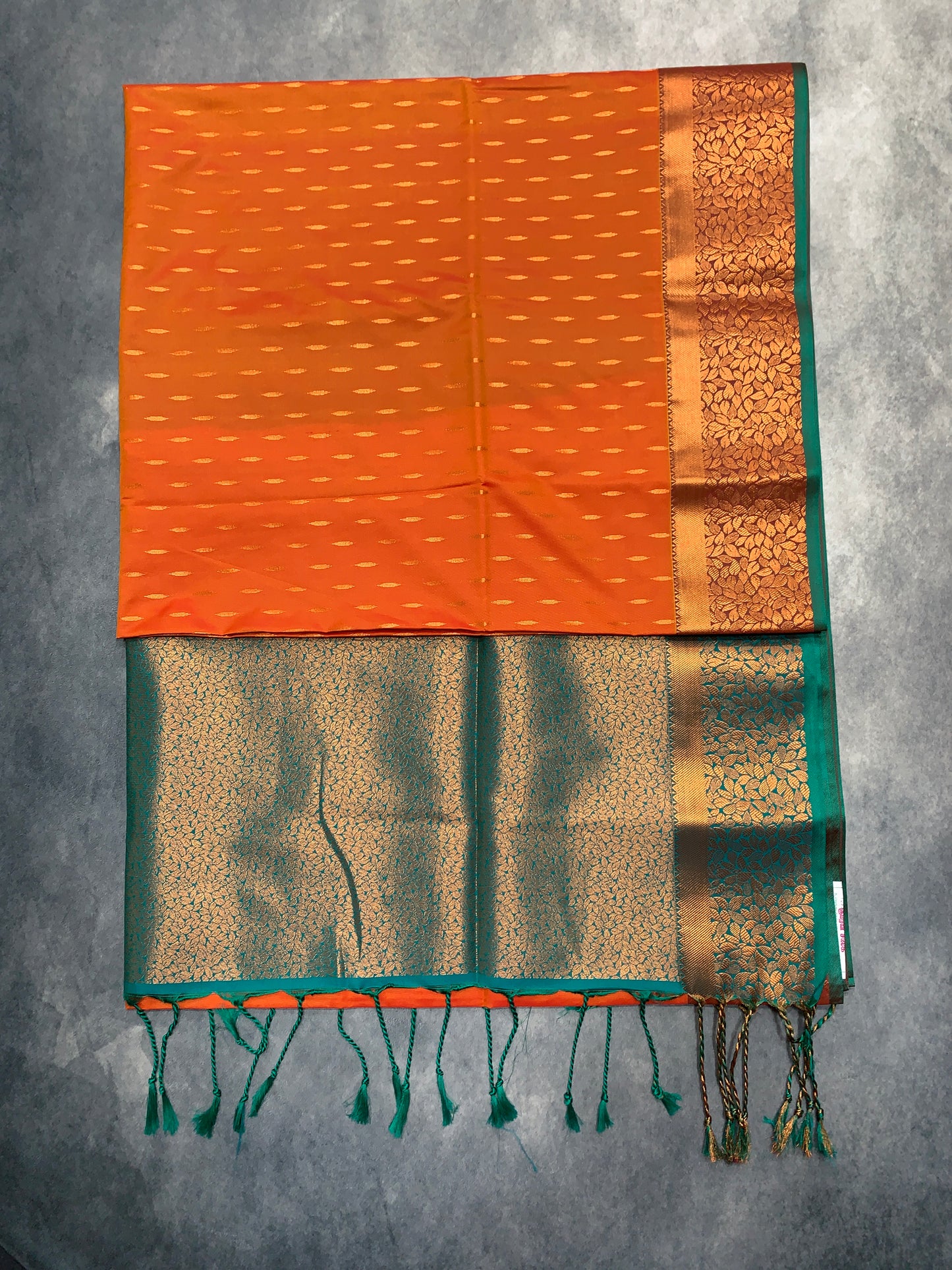 Soft Vegan Silk Saree Light Orange Colour with Green and Copper Border