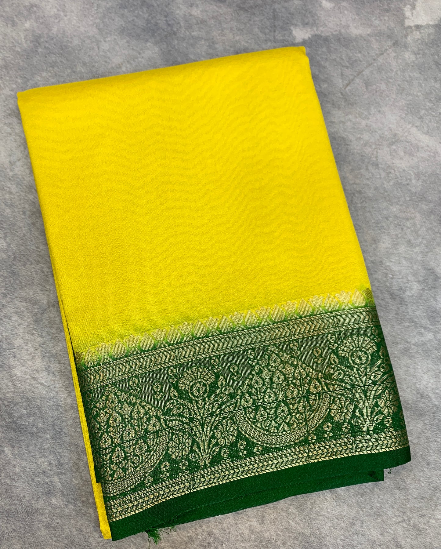Crepe Saree Lemon Yellow Colour with Green Border