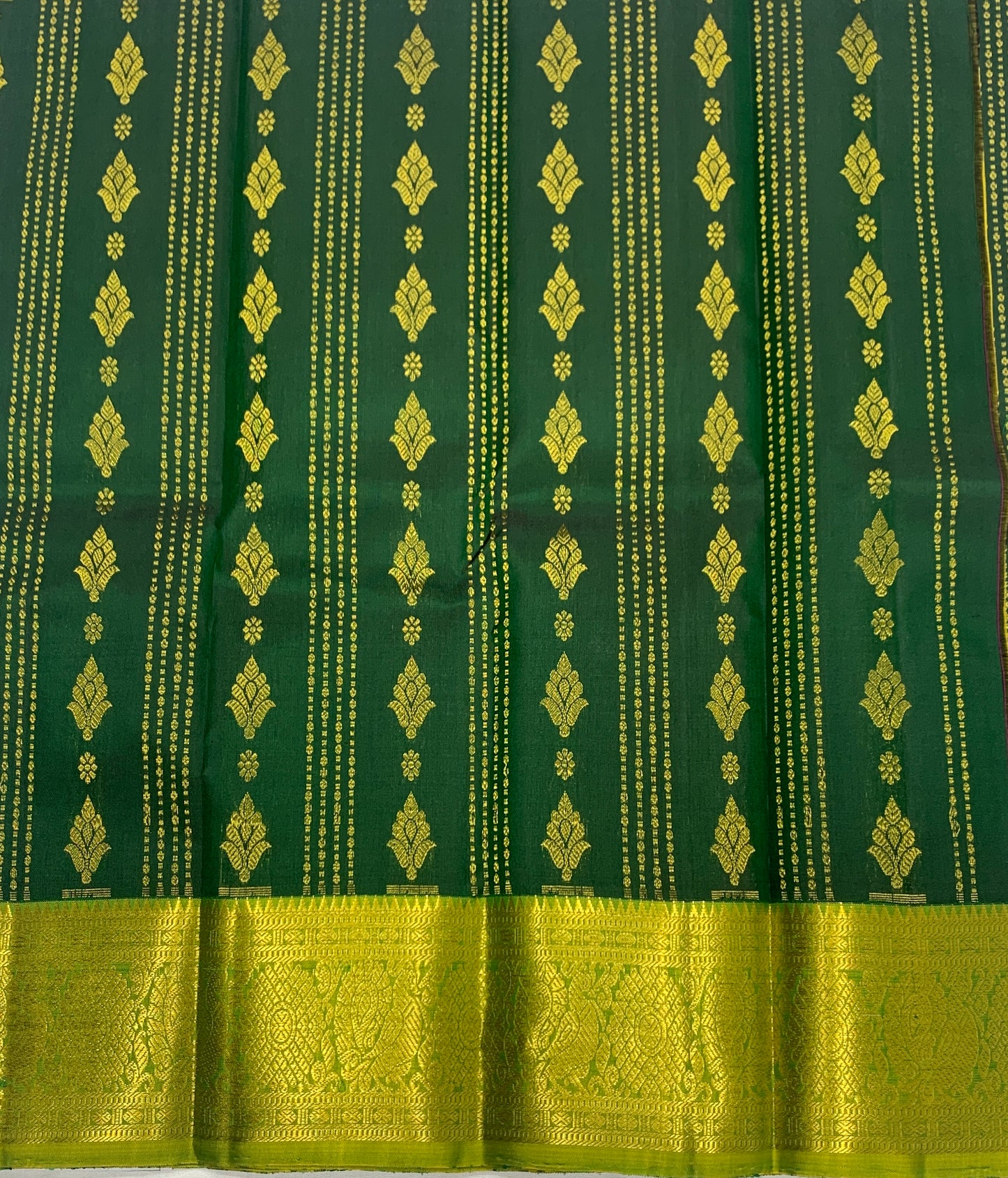 Green shade Pure kanchipuram Kids Pattu Pavadai with contrast border for newborn to 2 Years