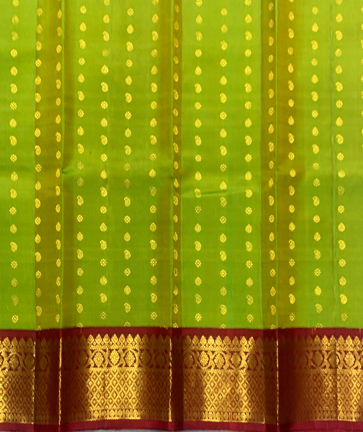 Lime Green Shade Pure Kanchipuram Kids Pattu Pavadai with Contrast Border for Newborn to 2 Years