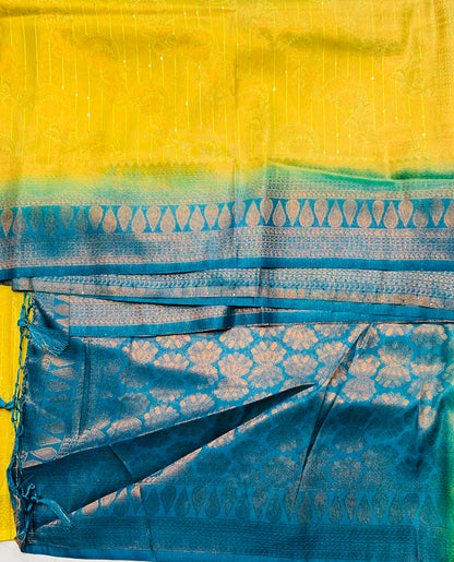 Yellow shade Kuberra Pattu with Sky Blue Pallu