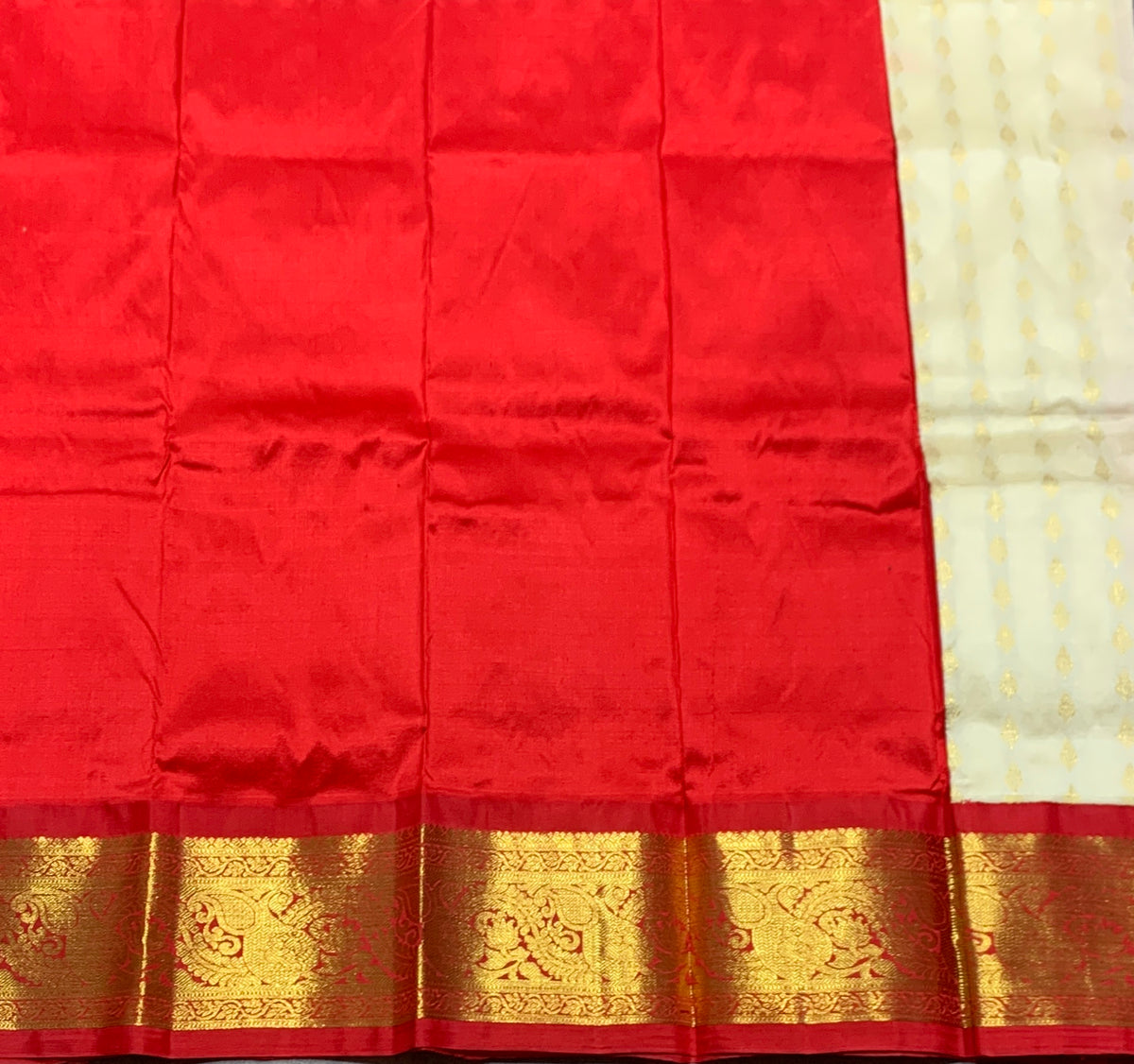 Ivory Shade Pure Kanchipuram Kids Pattu Pavadai with Contrast Border for Newborn to 2 Years