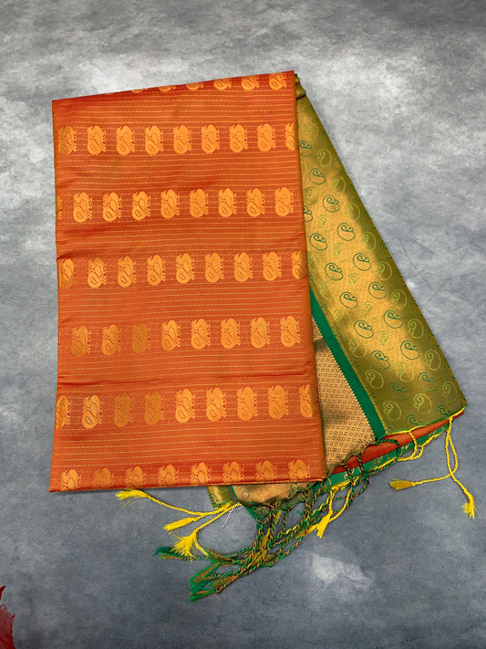 Soft Vegan Silk Saree Orange Colour with Green and Copper Border