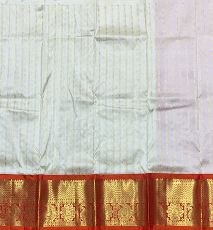 Ivory Shade Pure Kanchipuram Kids Pattu Pavadai with Contrast Border for age 2 to 5