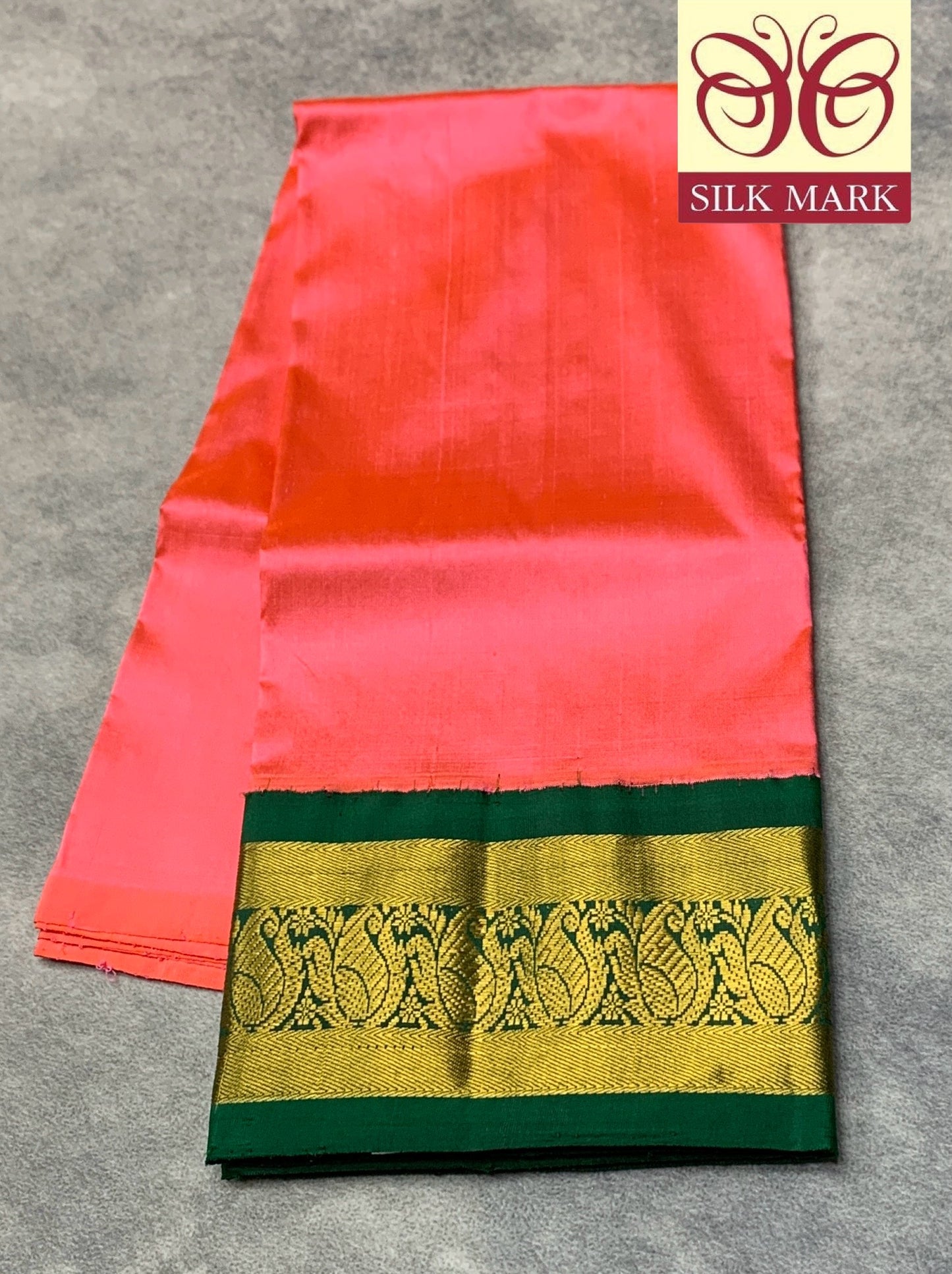 Peachish Pink Shade Pure Kanchipuram Kids Pattu Pavadai with Contrast Border for age 2 to 5