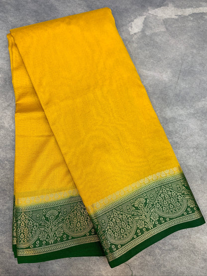 Crepe Saree Yellow Colour with Green Border