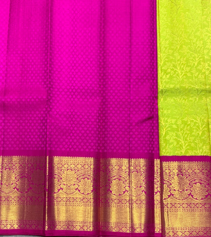 Lime Green Shade Pure Kanchipuram Kids Pattu Pavadai with Contrast Border for Newborn to 2 Years
