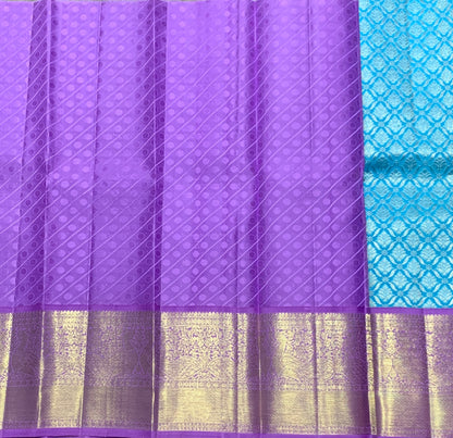 Sky Blue Shade Pure Kanchipuram Kids Pattu Pavadai with Contrast Border for Newborn to 2 Years
