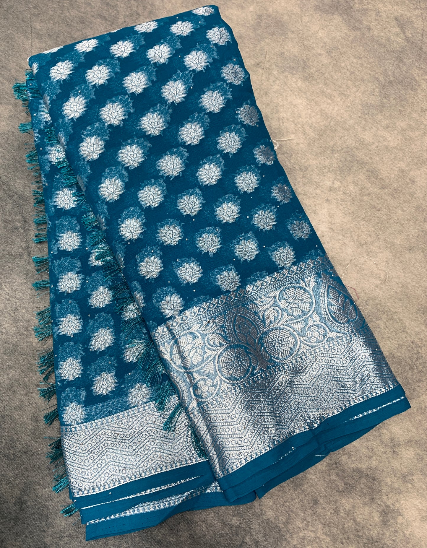 Georgette Saree Peacock Blue Colour with Sliver Floral Design Border