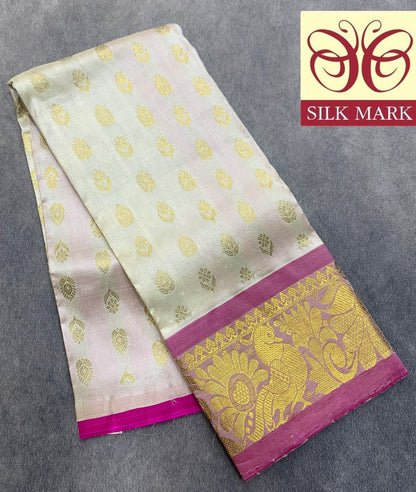 Ivory Shade Pure Kanchipuram Kids Pattu Pavadai with Contrast Border for Newborn to 2 Years