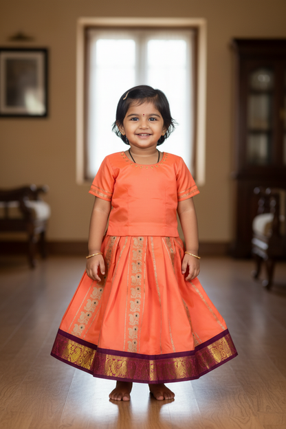 Salmon shade Semi silk Kids Pattu Pavadai with contrast border for age 2 to 5