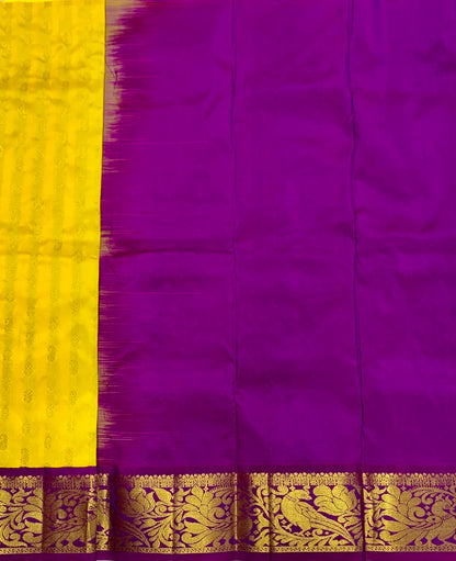 Yellow shade Pure kanchipuram Kids Pattu Pavadai with contrast border for newborn to 2 Years