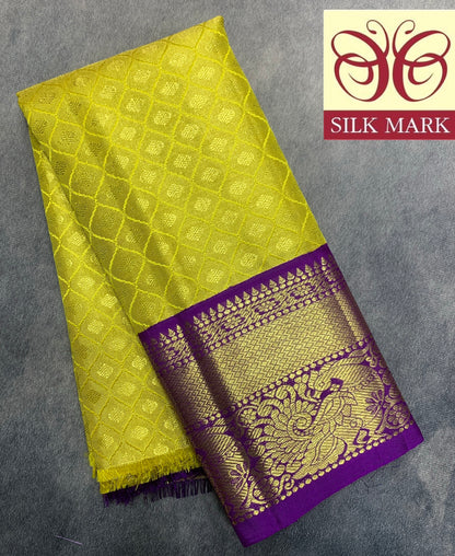 Yellow Shade Pure Kanchipuram Kids Pattu Pavadai with Contrast Border for Newborn to 2 Years