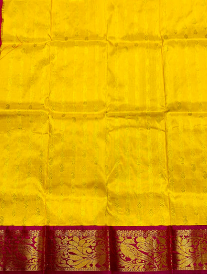 Yellow shade Pure kanchipuram Kids Pattu Pavadai with contrast border for newborn to 2 Years