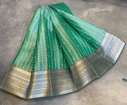 Fancy Tissue Saree Light Green Colour with Self Design Border