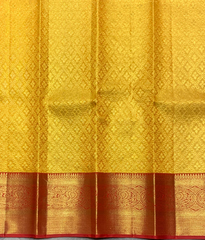 Golden Yellow Shade Pure Kanchipuram Kids Pattu Pavadai with Contrast Border for Newborn to 2 Years
