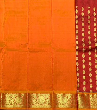 Maroon Shade Pure Kanchipuram Kids Pattu Pavadai with Contrast Border for Newborn to 2 Years