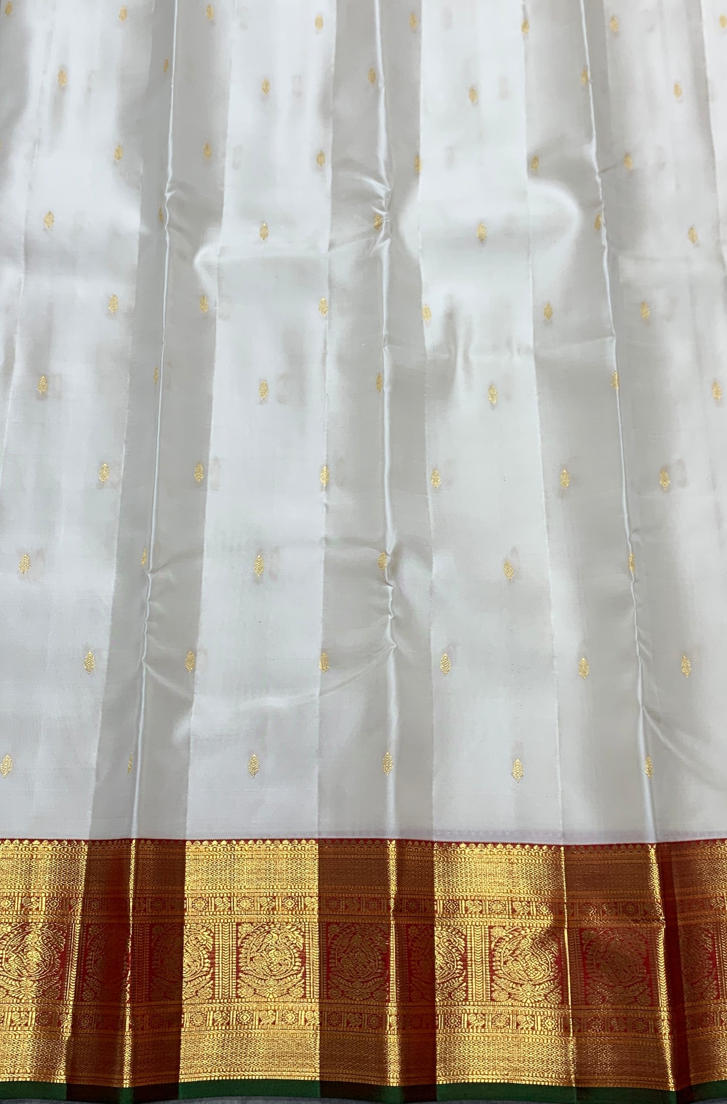 Pure Kanchipuram Silk Off White Colour with Red and Golden Zari Border