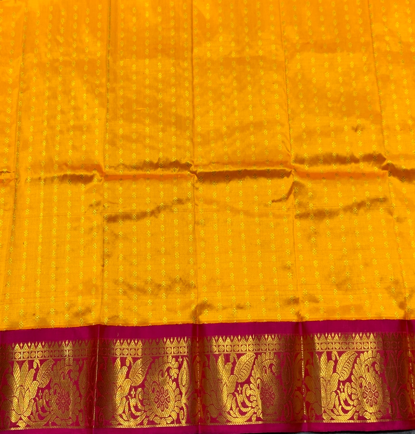 Yellow Shade Pure Kanchipuram Kids Pattu Pavadai with Contrast Border for Newborn to 2 Years