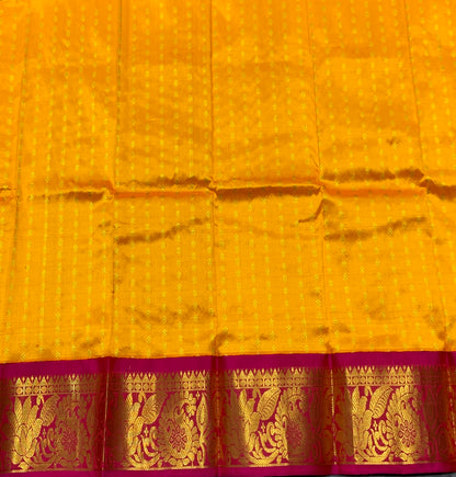 Yellow Shade Pure Kanchipuram Kids Pattu Pavadai with Contrast Border for Newborn to 2 Years