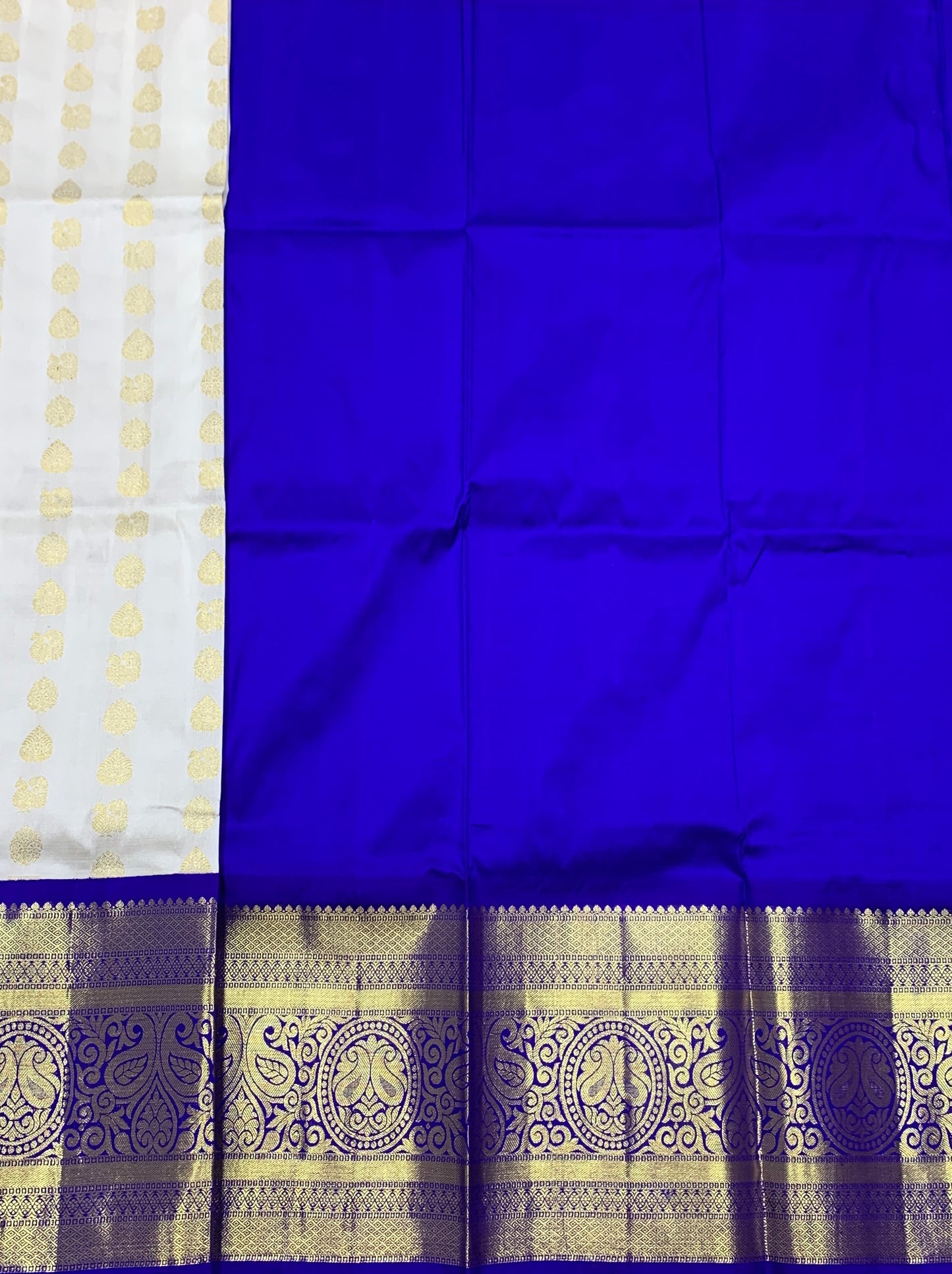 White Shade Pure Kanchipuram Kids Pattu Pavadai with Contrast Border for age 5 to 10