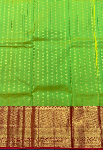 Parrot Green Shade Pure Kanchipuram Kids Pattu Pavadai with Contrast Border for Age Above 10 Years