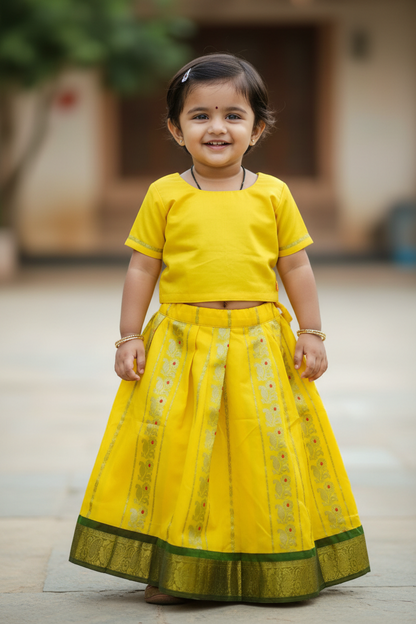 Yellow shade Semi silk Kids Pattu Pavadai with contrast border for age 2 to 5