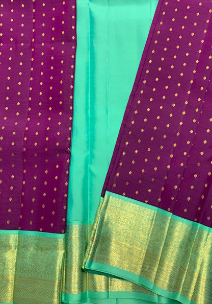 Pure Kanchipuram Silk Magenta Colour with Sapphire and Golden Zari Border