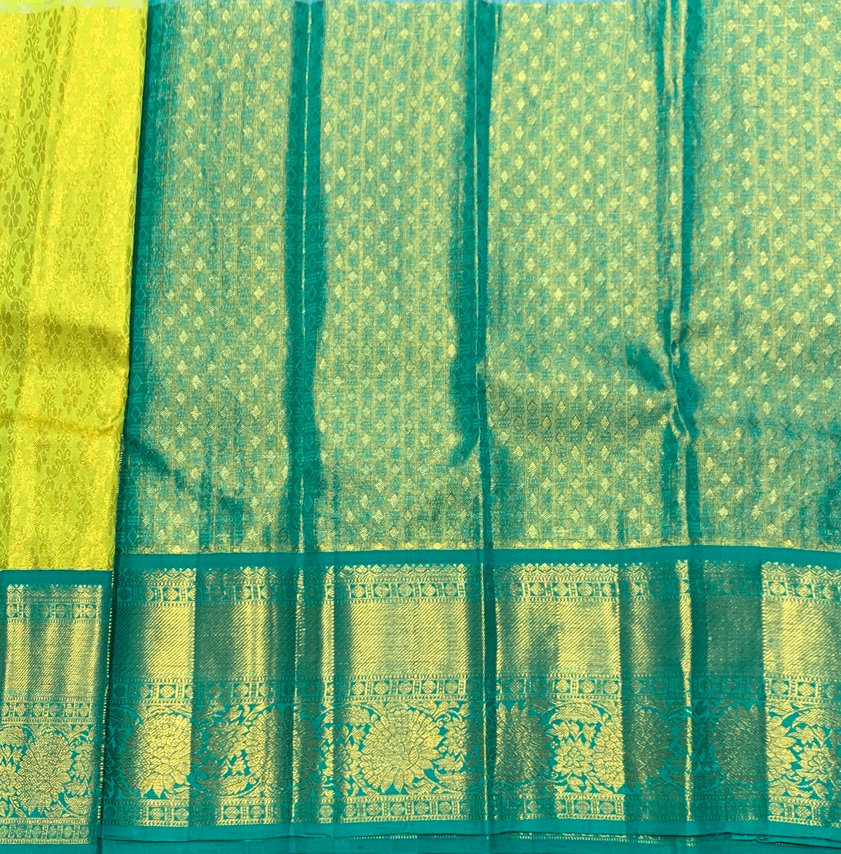 Lime Yellow Shade Pure Kanchipuram Kids Pattu Pavadai with Contrast Border for Newborn to 2 Years