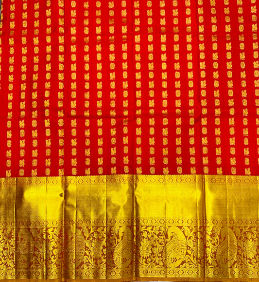 Red shade Pure Kanchipuram Kids Pattu Pavadai with contrast border for age 5 to 10