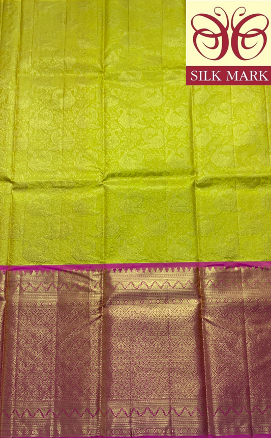 Yellow Shade Pure Kanchipuram Kids Pattu Pavadai with Contrast Border for Age Above 10 Years