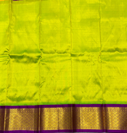 Apple Green Shade Pure Kanchipuram Kids Pattu Pavadai with Contrast Border for Newborn to 2 Years