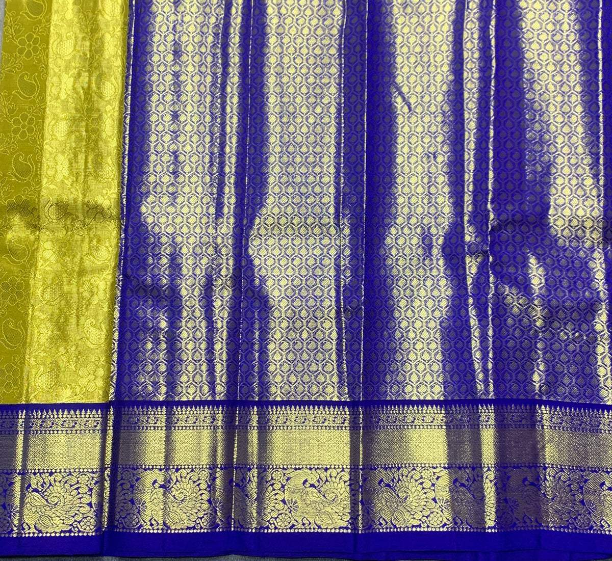 Yellow Shade Pure Kanchipuram Kids Pattu Pavadai with Contrast Border for Newborn to 2 Years