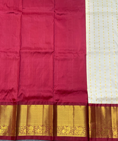 Ivory Shade Pure Kanchipuram Kids Pattu Pavadai with Contrast Border for age 5 to 10