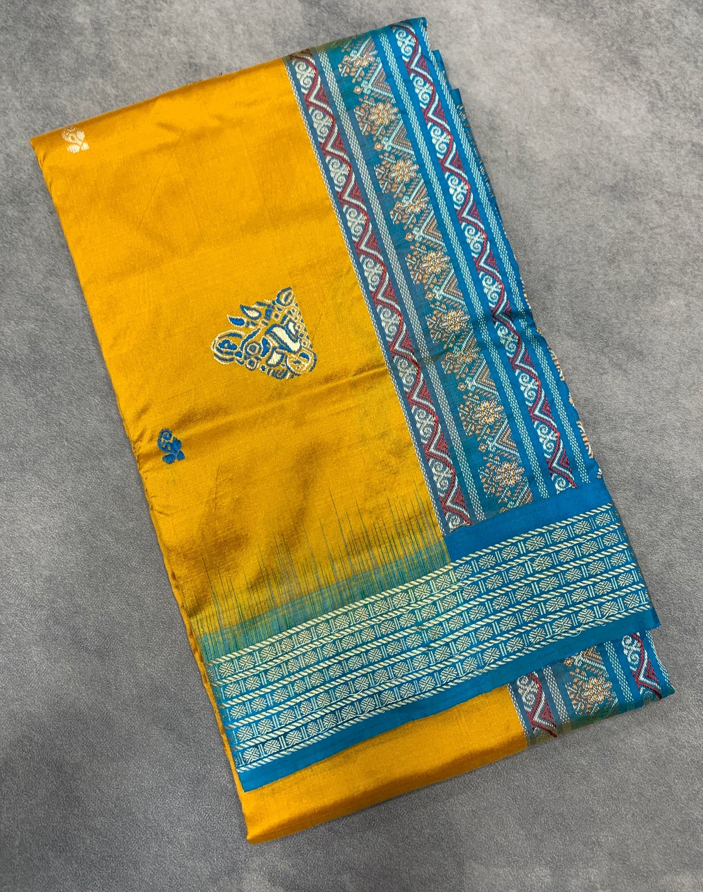 Pure Kanchipuram Silk Mustard Yellow Colour with Sky Blue Colour Thread Work Border