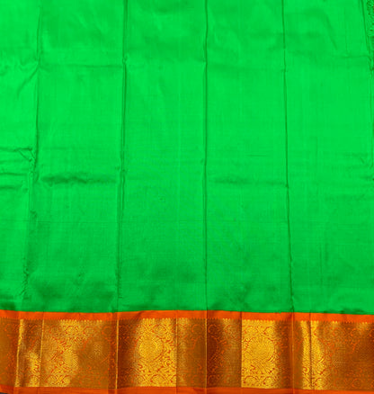Light Green Shade Pure Kanchipuram Kids Pattu Pavadai with Contrast Border for Newborn to 2 Years