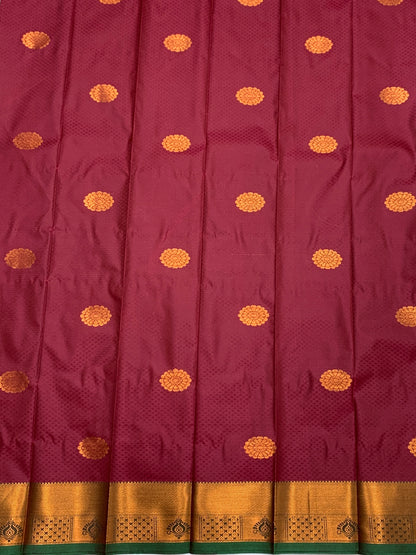 Maroon Shade Silk Cotton Saree with Copper Zari Border and Floral Design