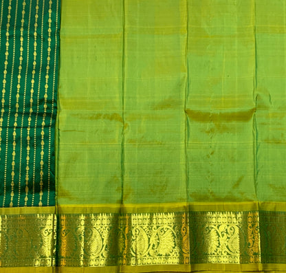 Green Shade Pure Kanchipuram Kids Pattu Pavadai with Contrast Border for Newborn to 2 Years