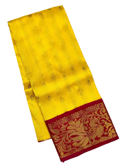 Yellow shade Pure kanchipuram Kids Pattu Pavadai with contrast border for newborn to 2 Years