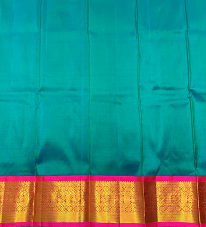 Rama Green shade Pure Kanchipuram Kids Pattu Pavadai with Contrast Border for Newborn to 2 Years