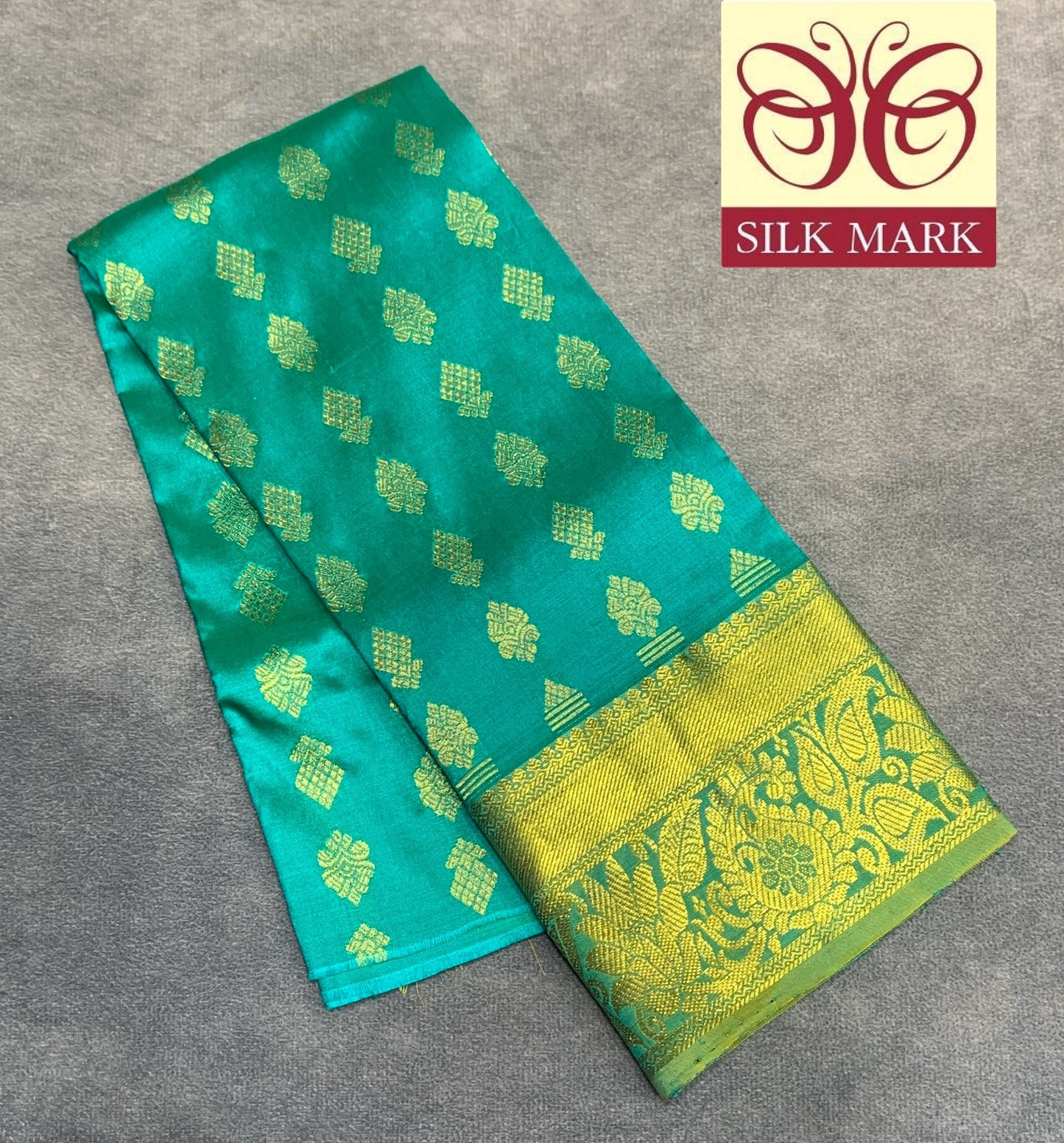 Rama Green Shade Pure Kanchipuram Kids Pattu Pavadai with Contrast Border for Newborn to 2 Years